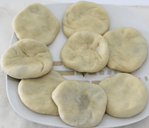 Potato Balls enclosed and ball flattened into small discs