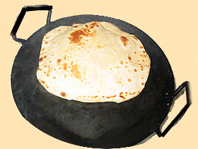  roti being cooked